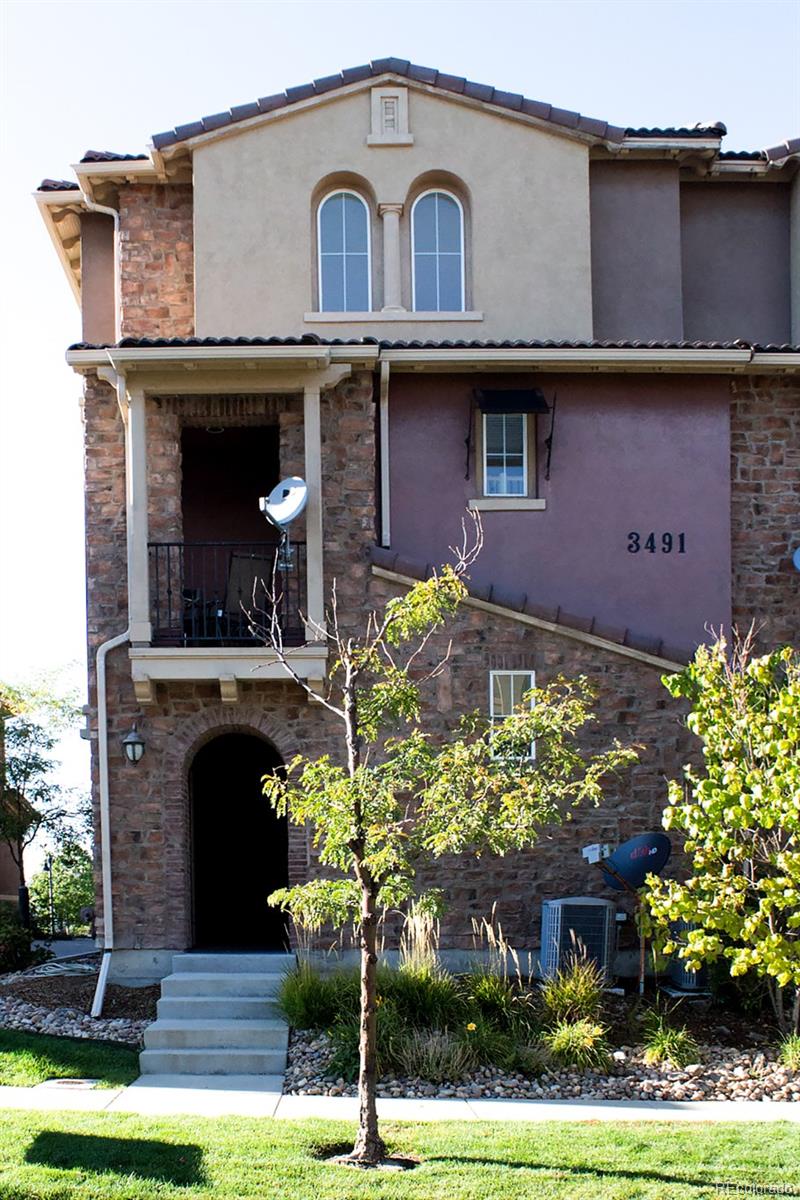 3491 Cascina Place, Unit D Highlands Ranch, CO 80126 - Photo 1 of 22 a front view of a house