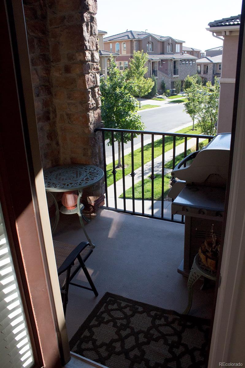3491 Cascina Place, Unit D Highlands Ranch, CO 80126 - Photo 20 of 22 a view of balcony with a couple of chairs