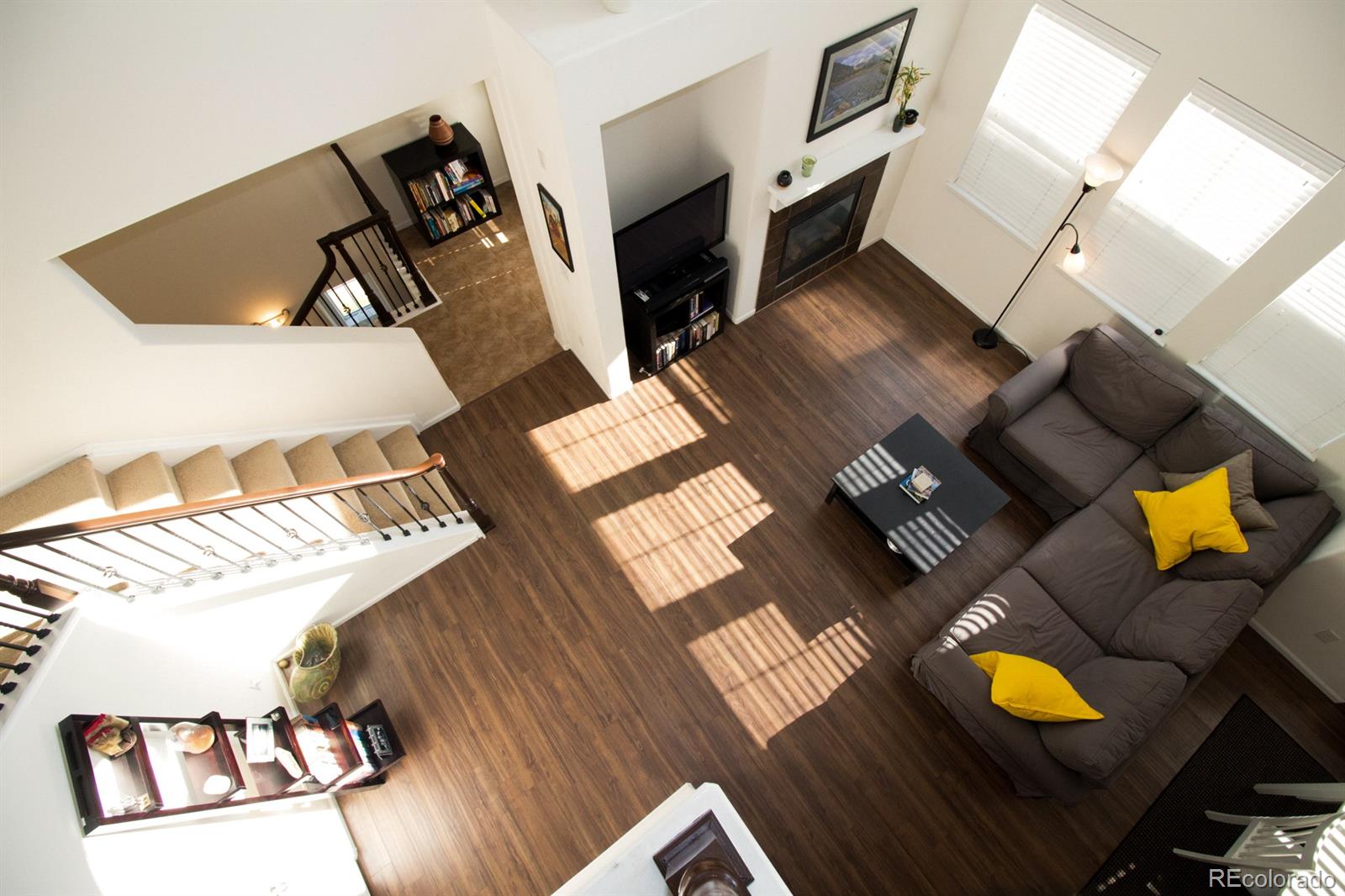 3491 Cascina Place, Unit D Highlands Ranch, CO 80126 - Photo 7 of 22 a living room with furniture and wooden floor