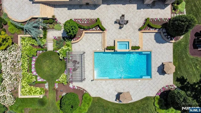 an aerial view of a swimming pool