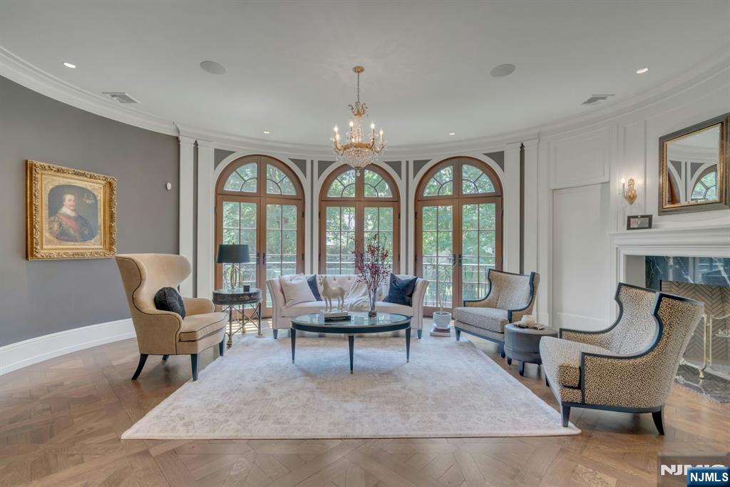 123 East Saddle River Road Saddle River, NJ 07458 - Photo 32 of 50 a living room with furniture and a large window