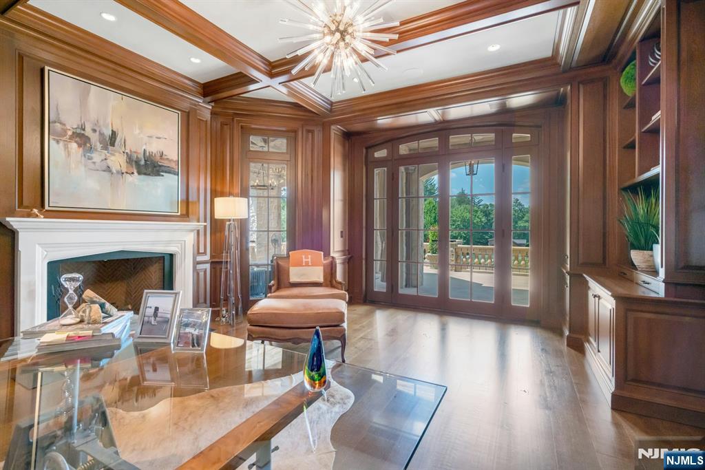 123 East Saddle River Road Saddle River, NJ 07458 - Photo 34 of 50 a living room with furniture and a fireplace