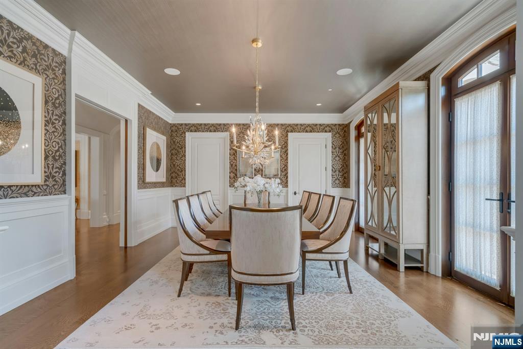 123 East Saddle River Road Saddle River, NJ 07458 - Photo 35 of 50 a view of a dining room with furniture window and wooden floor