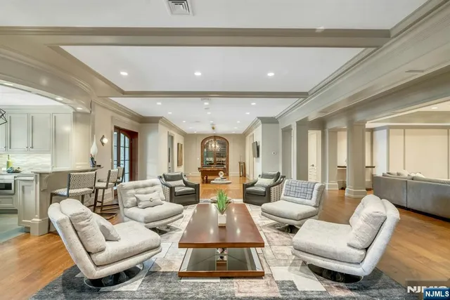 a living room with furniture or couch and a large window