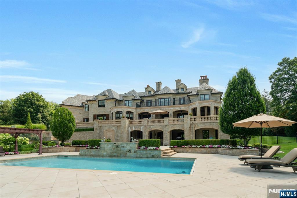 123 East Saddle River Road Saddle River, NJ 07458 - Photo 10 of 50 a building view with sitting space and garden view