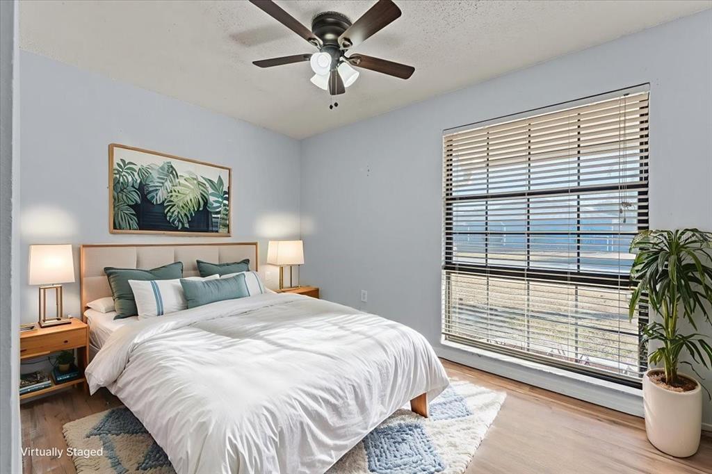 3701 Modesto Street New Port Richey, FL 34655 - Photo 16 of 41 a bedroom with a large bed and a window