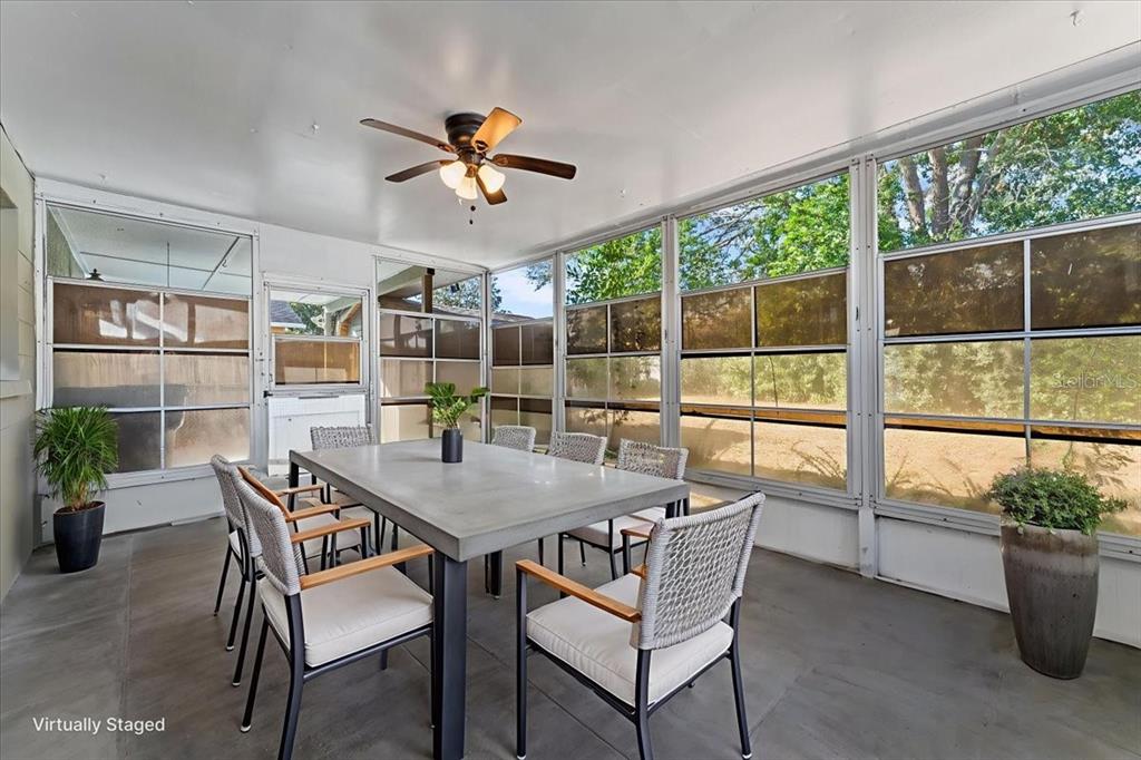 3701 Modesto Street New Port Richey, FL 34655 - Photo 21 of 41 a dining room with furniture window and outside view