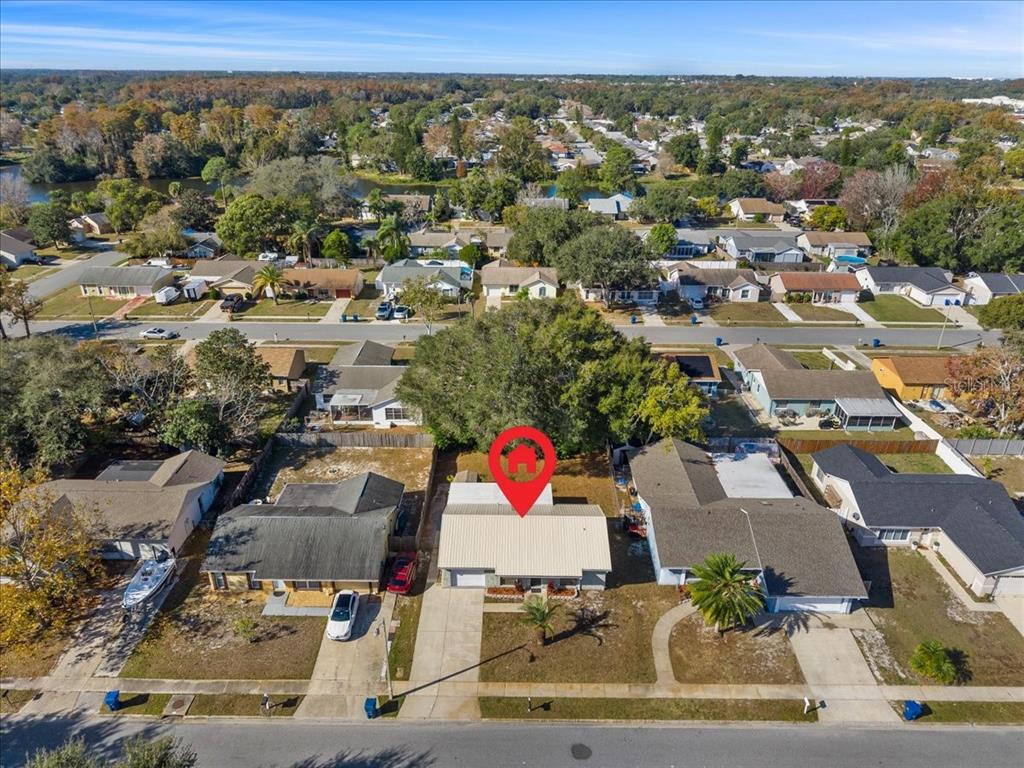 3701 Modesto Street New Port Richey, FL 34655 - Photo 35 of 41 an aerial view of residential houses with outdoor space