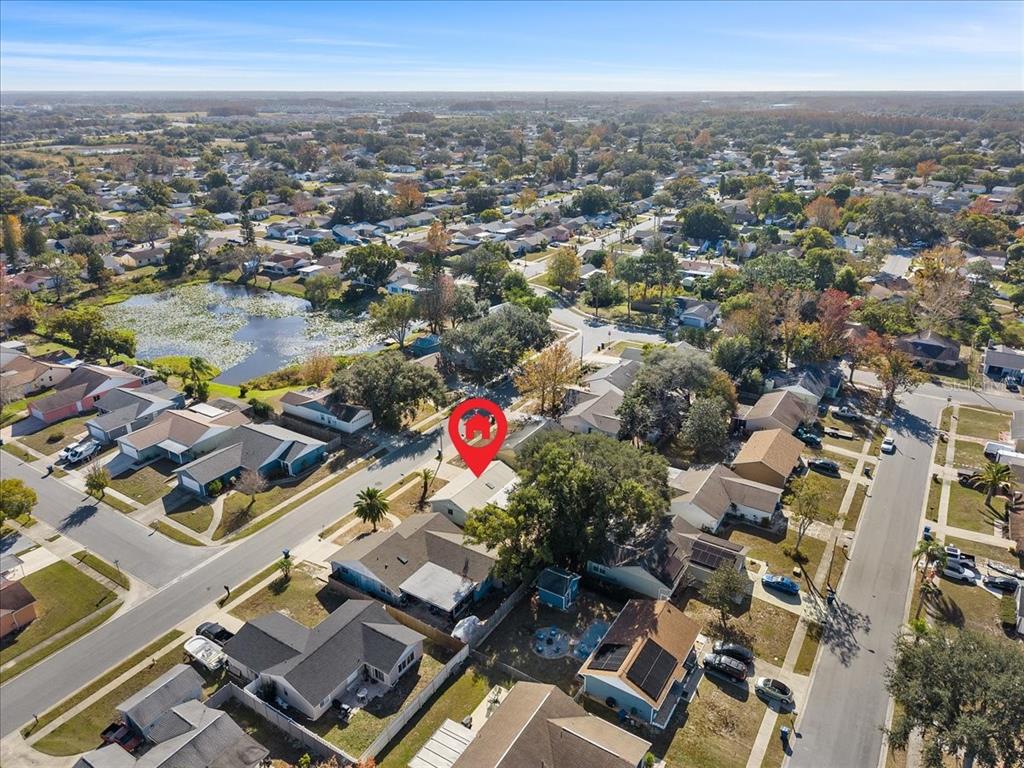 3701 Modesto Street New Port Richey, FL 34655 - Photo 38 of 41 an aerial view of residential houses with outdoor space