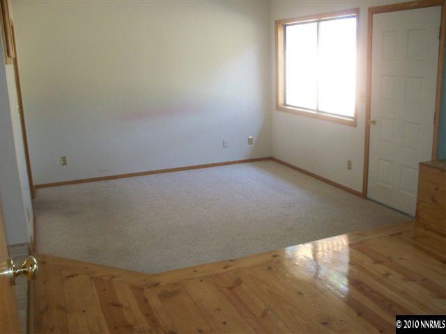 1713 Rice Road Fallon, NV 89406 - Photo 4 of 9 an empty room with a window