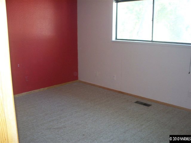 1713 Rice Road Fallon, NV 89406 - Photo 8 of 9 an empty room with a window