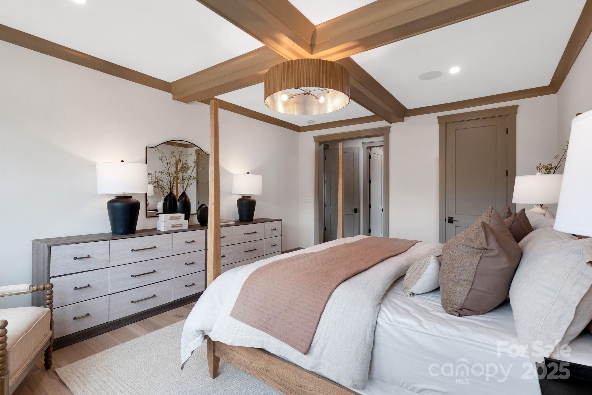 13648 Glennmayes Road Huntersville, NC 28078 - Photo 11 of 32 a bedroom with a large bed and a dresser