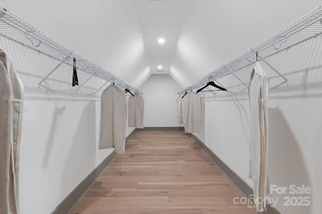 a view of a hallway with stairs