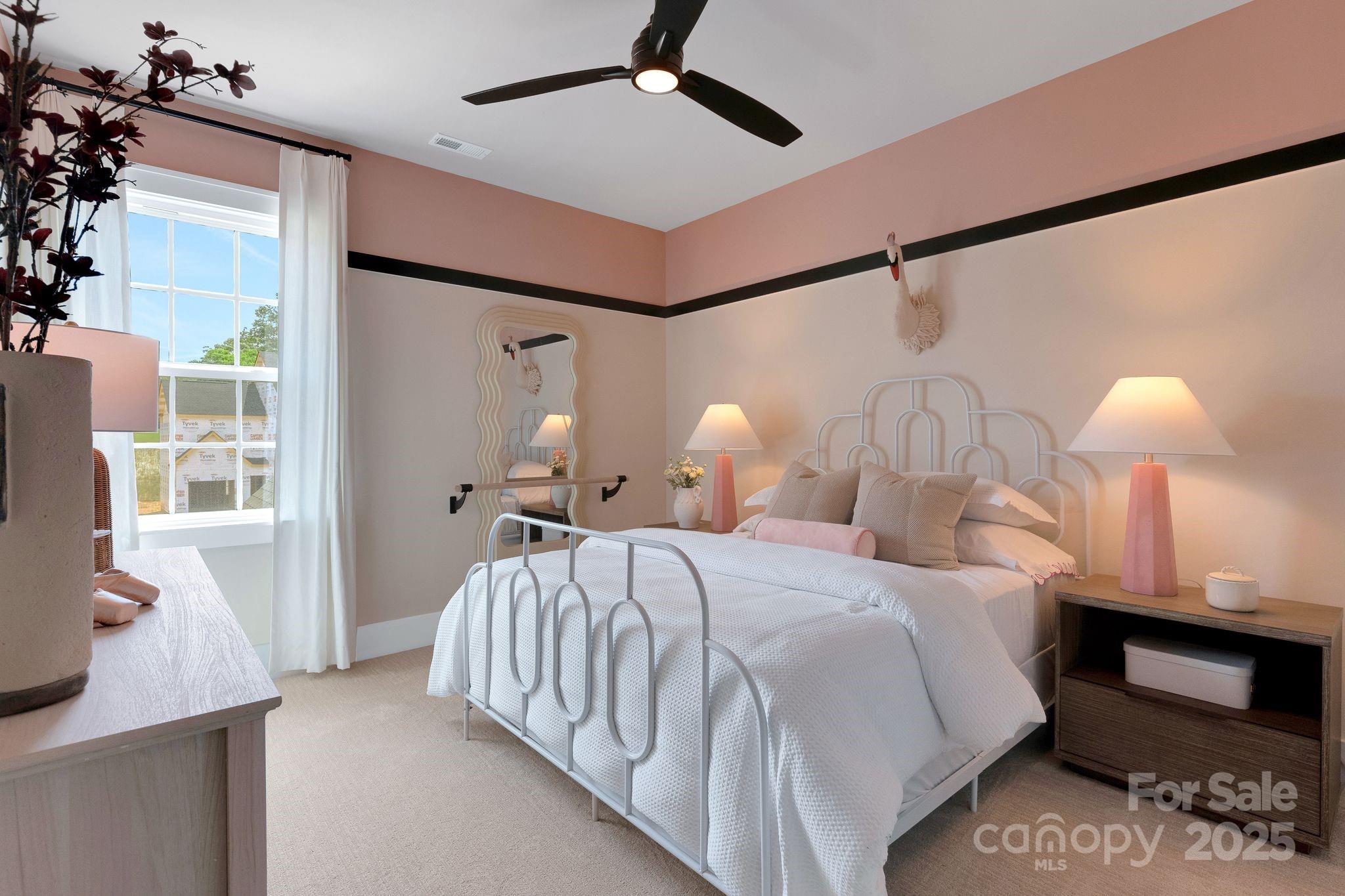 13648 Glennmayes Road Huntersville, NC 28078 - Photo 19 of 32 a bedroom with a bed and a window