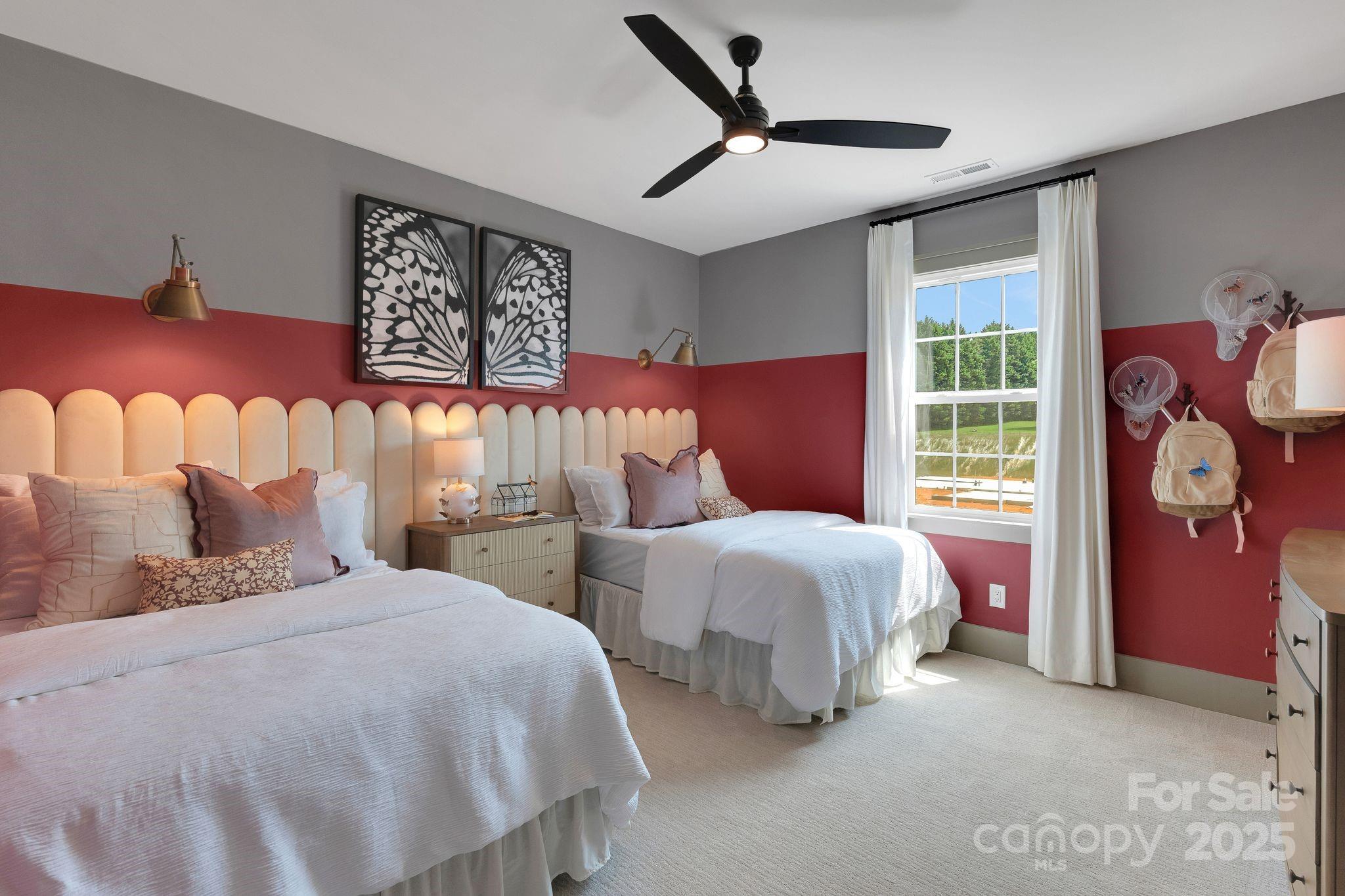 13648 Glennmayes Road Huntersville, NC 28078 - Photo 21 of 32 a bedroom with two beds and a window