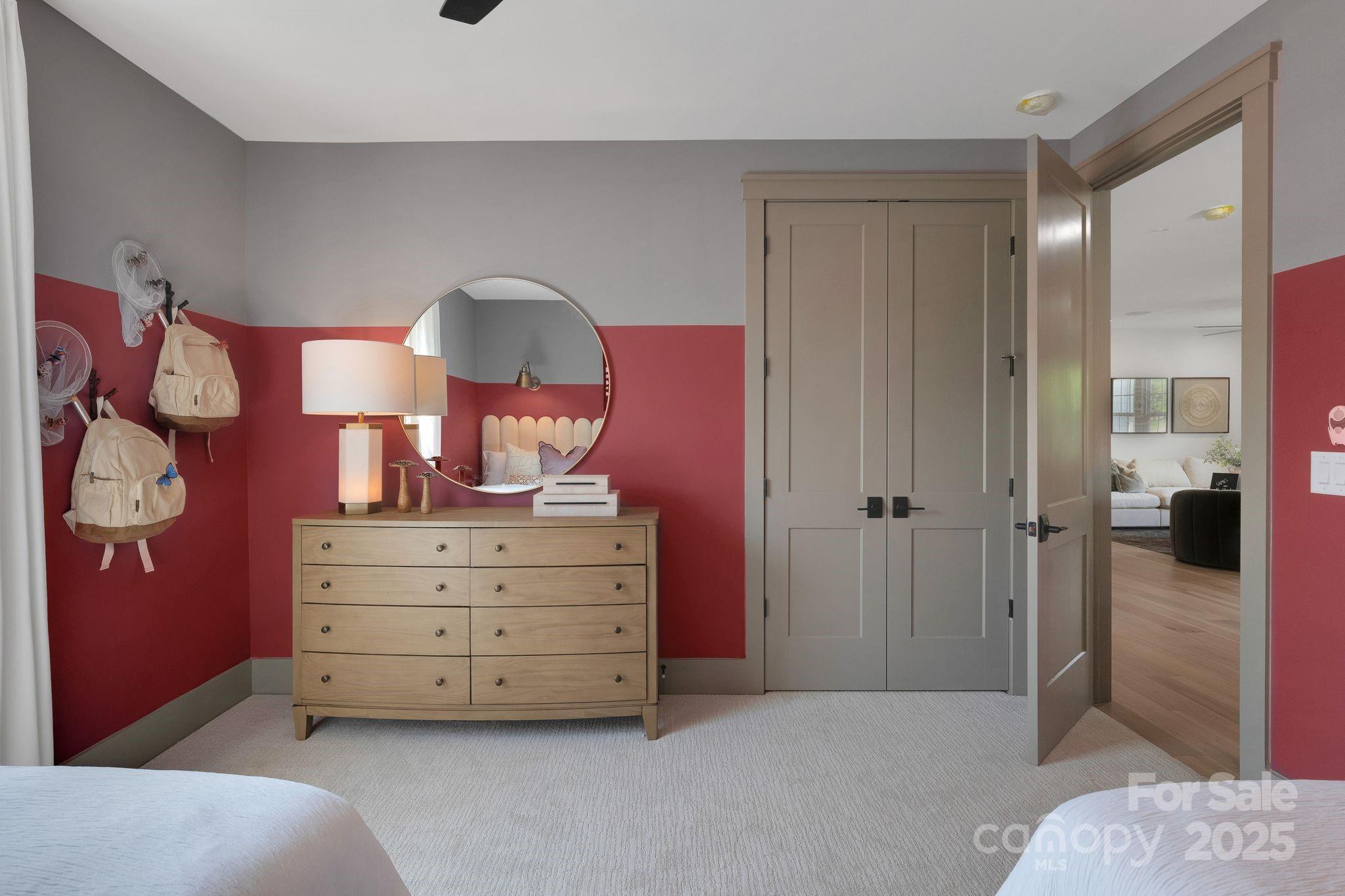13648 Glennmayes Road Huntersville, NC 28078 - Photo 22 of 32 a room with a bed and a lamp