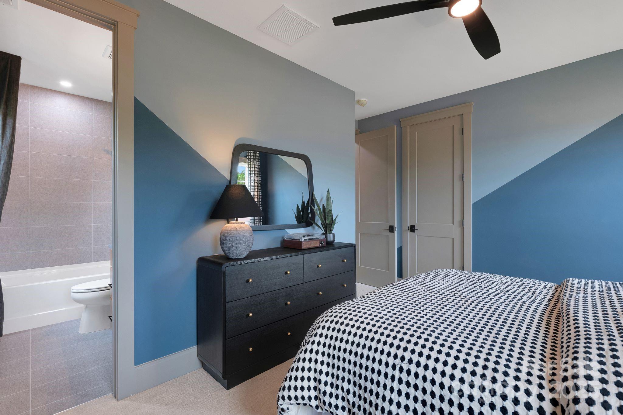 13648 Glennmayes Road Huntersville, NC 28078 - Photo 26 of 32 a bedroom with a bed and a dresser