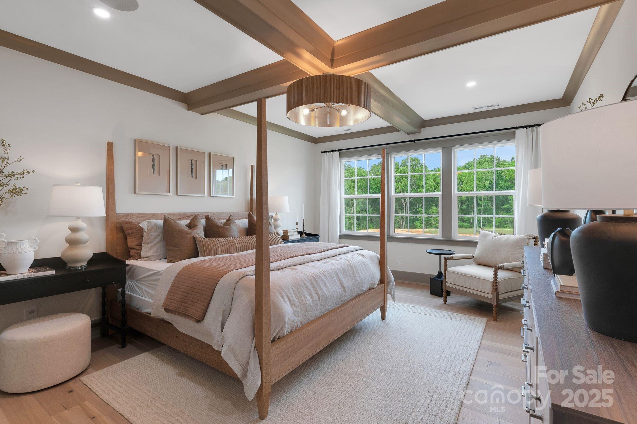 13648 Glennmayes Road Huntersville, NC 28078 - Photo 10 of 32 a bed room with a bed couch and a large window