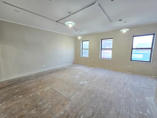 an empty room with windows