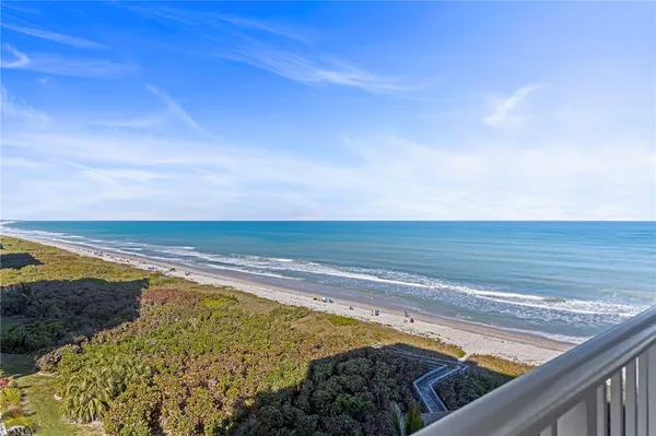 a view of an ocean from a balcony