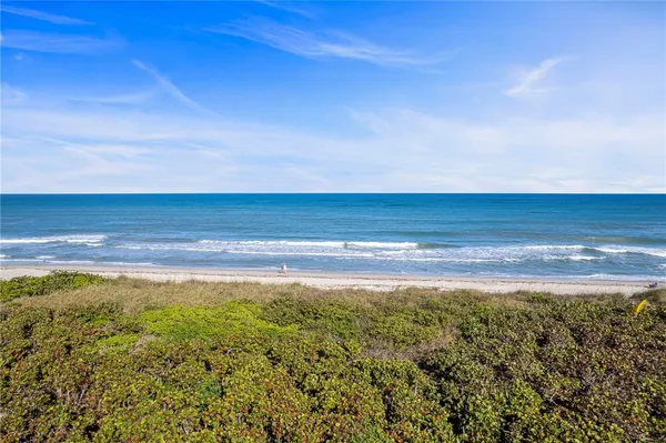 a view of an ocean and beach
