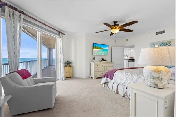 a bedroom with a bed furniture and a window