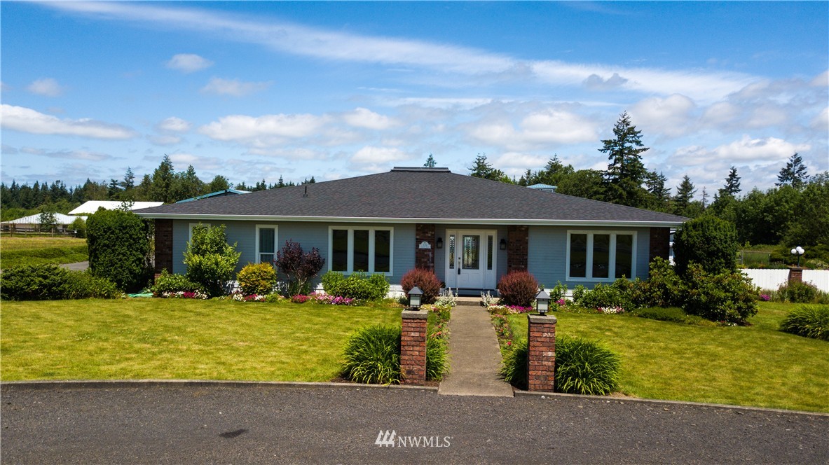 220 Sargent Road Winlock, WA 98596 - Photo 1 of 1 a front view of a house with a yard