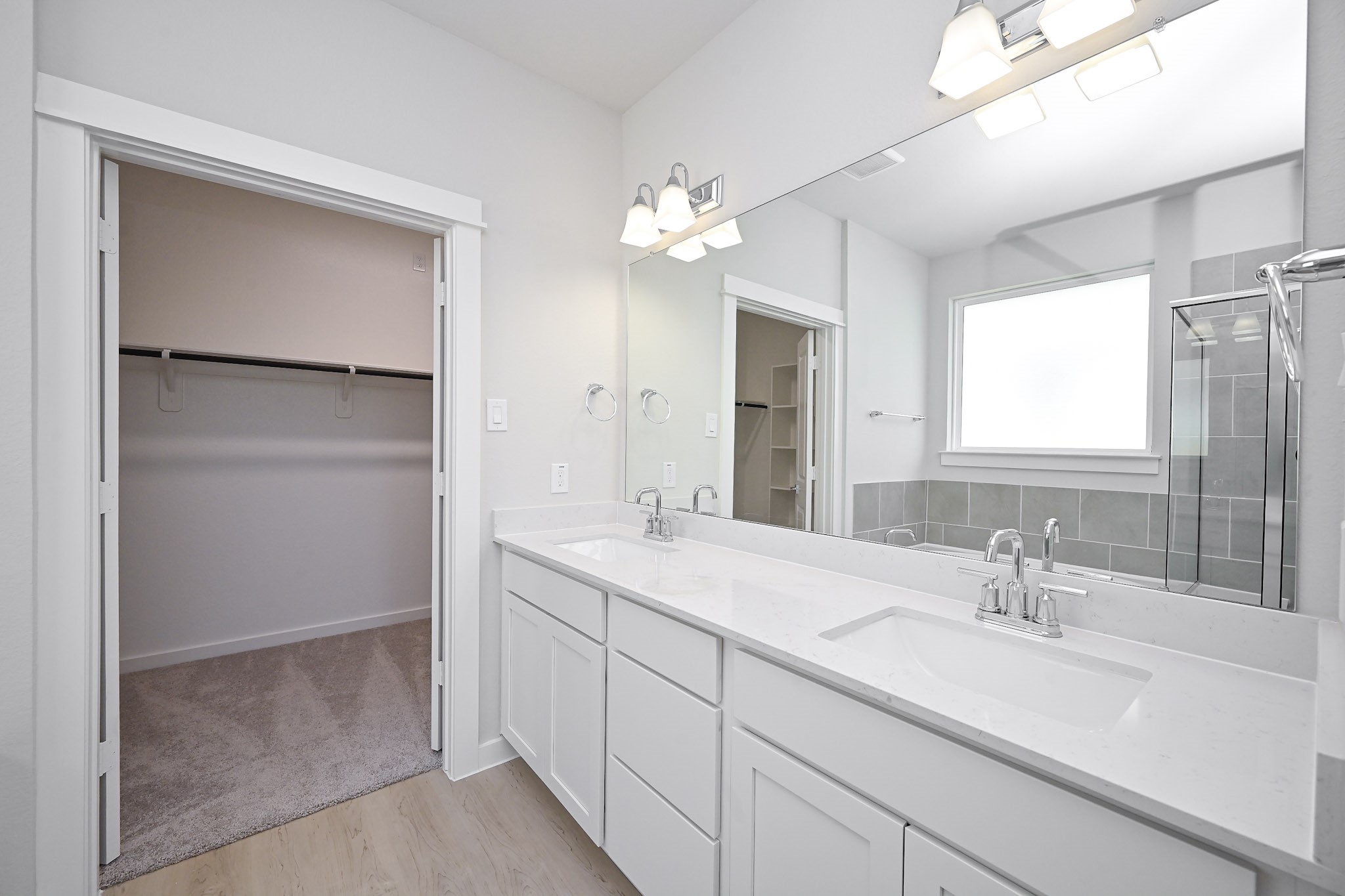 33019 School Hl Road Fulshear, TX 77441 - Photo 17 of 38 a bathroom with a sink and a mirror
