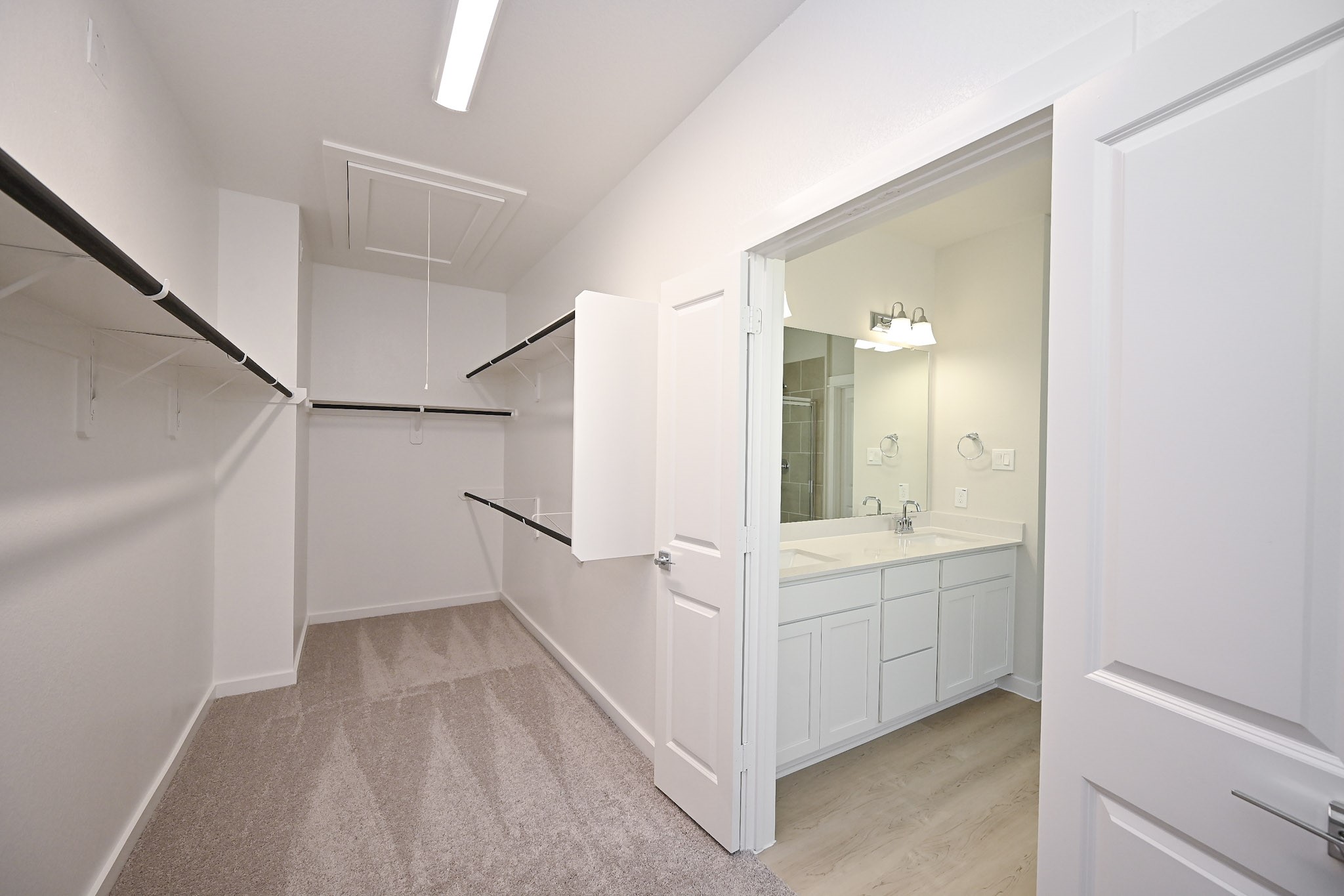 33019 School Hl Road Fulshear, TX 77441 - Photo 18 of 38 a view of bathroom with a sink mirror and window