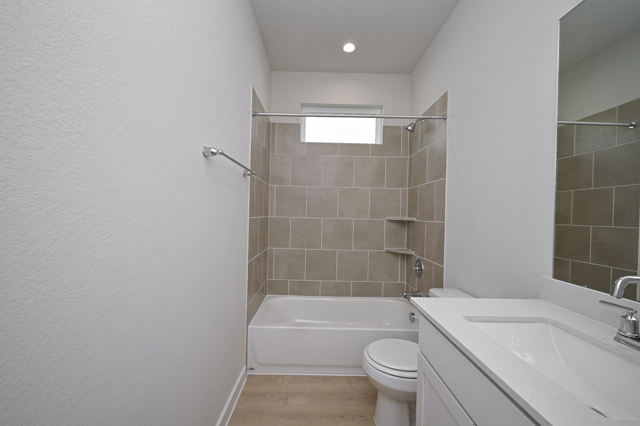 33019 School Hl Road Fulshear, TX 77441 - Photo 31 of 38 a bathroom with a sink a toilet and shower