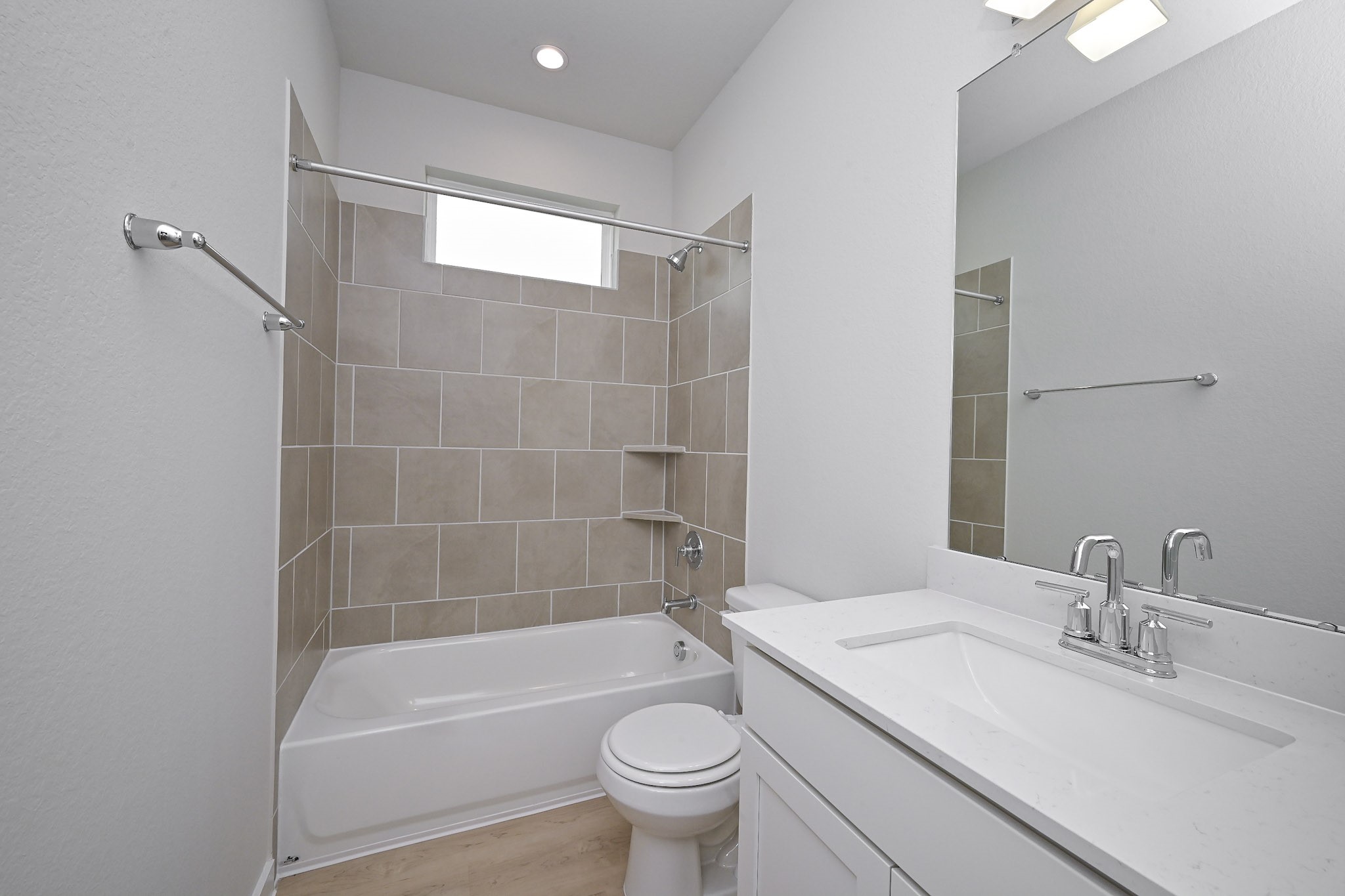 33019 School Hl Road Fulshear, TX 77441 - Photo 32 of 38 a bathroom with a sink a toilet and a bathtub