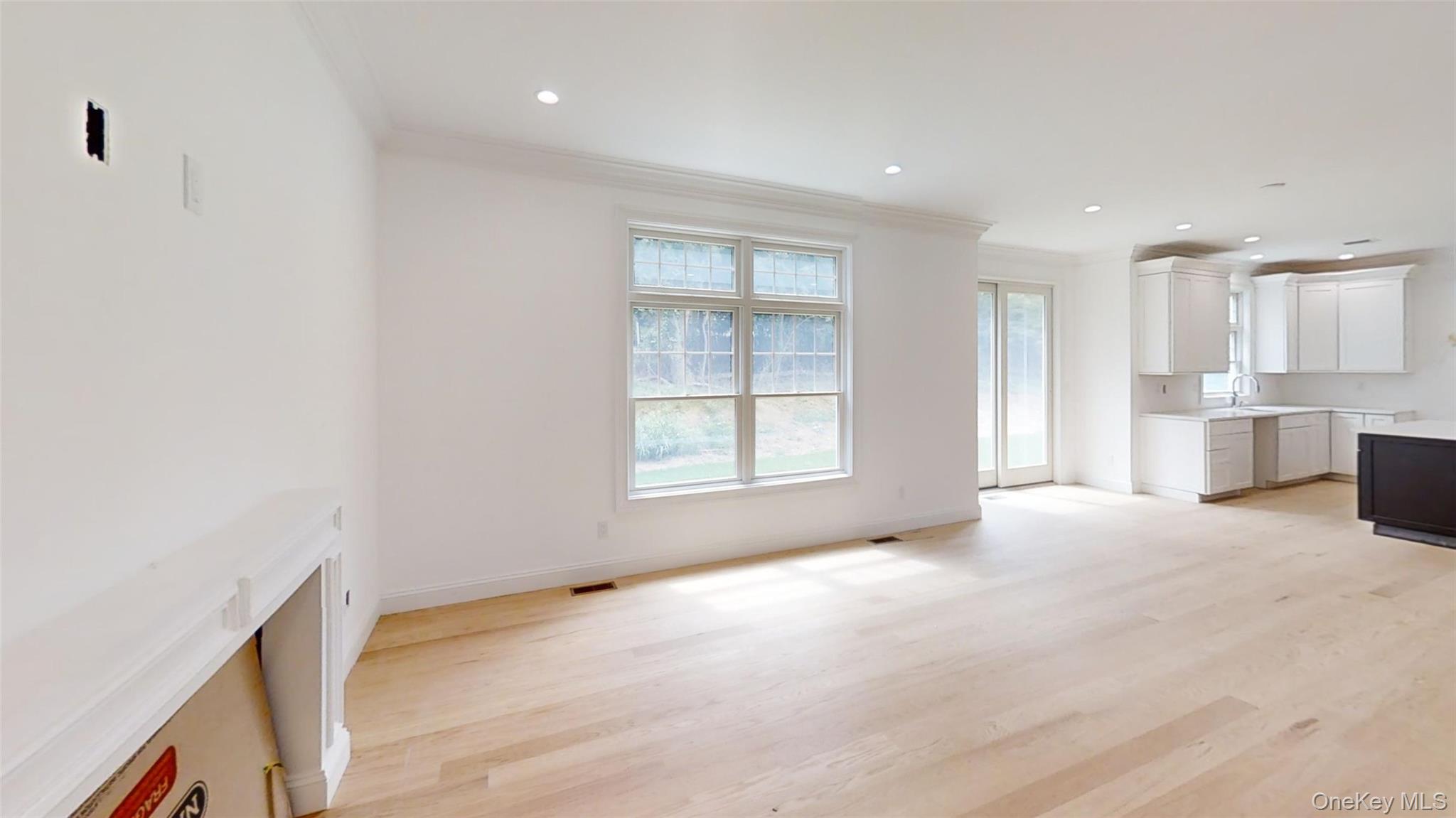 10 Winfield Drive Sound Beach, NY 11789 - Photo 5 of 11 a view of an empty room with a window
