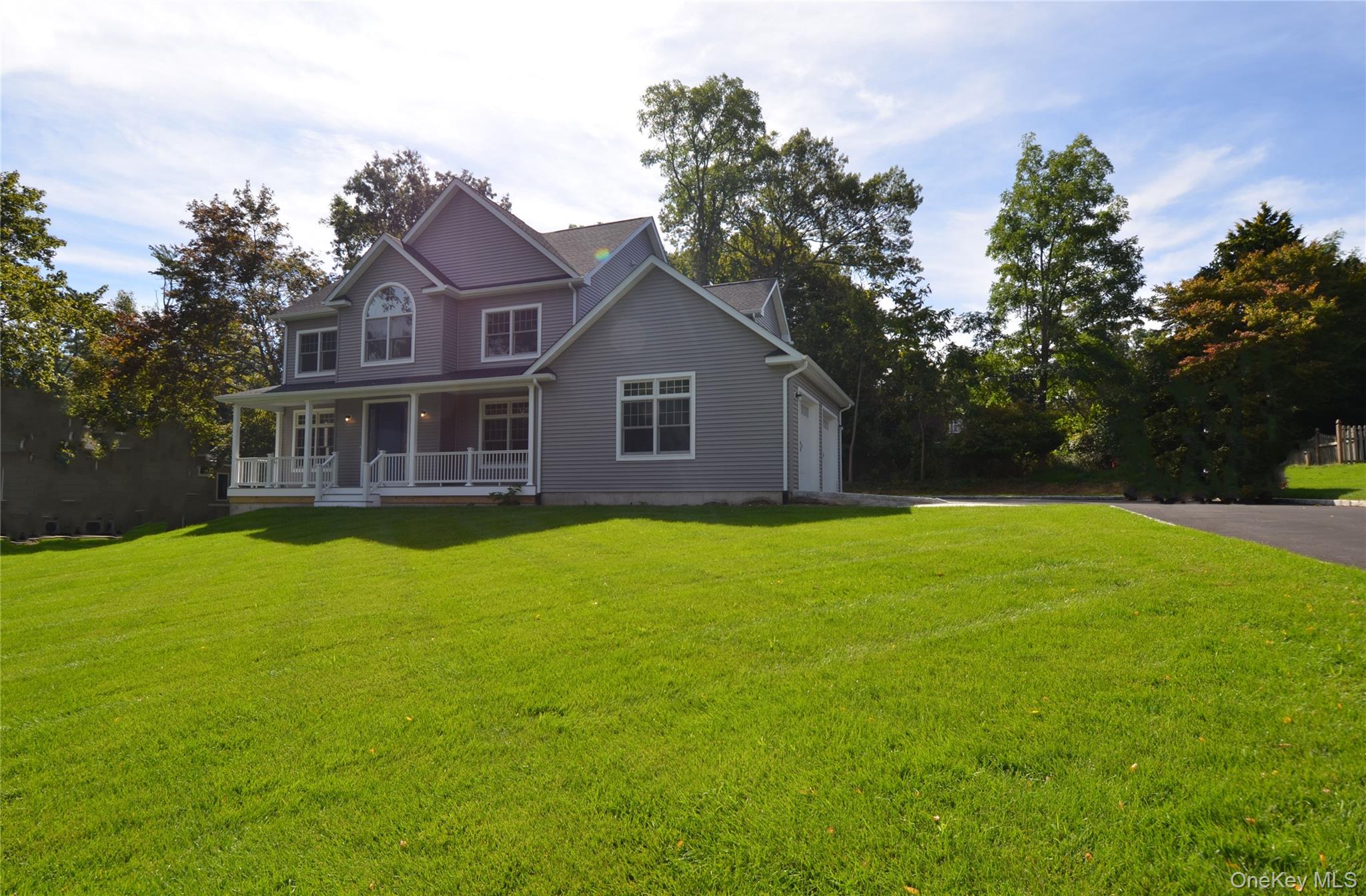 10 Winfield Drive Sound Beach, NY 11789 - Photo 7 of 11 a front view of house with yard and green space