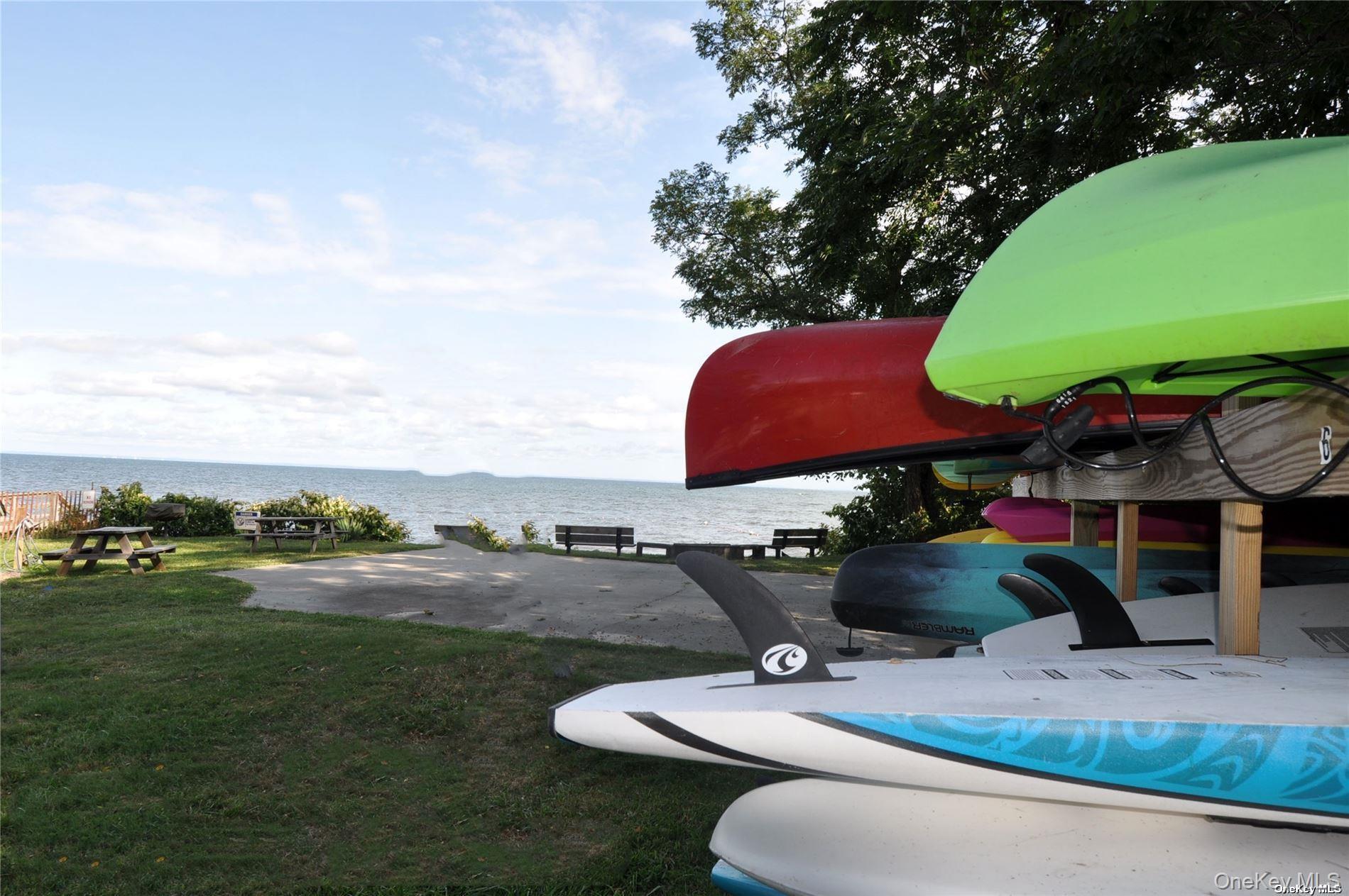 10 Winfield Drive Sound Beach, NY 11789 - Photo 8 of 11 a view of a backyard with sitting area