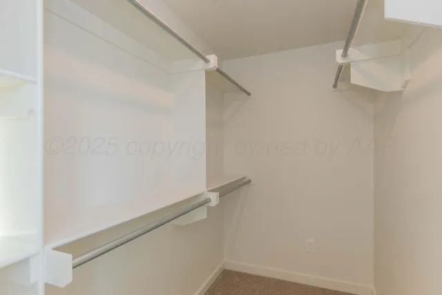 a view of small space with racks on the wall