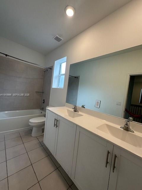 1405 Southeast 26th Avenue, Unit 1405 Homestead, FL 33035 - Photo 14 of 16 a bathroom with a double vanity sink toilet and a mirror