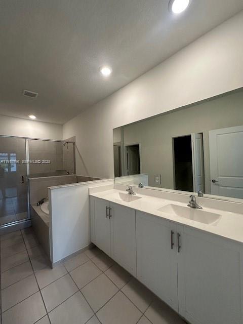 1405 Southeast 26th Avenue, Unit 1405 Homestead, FL 33035 - Photo 10 of 16 a bathroom with a double vanity sink and mirror