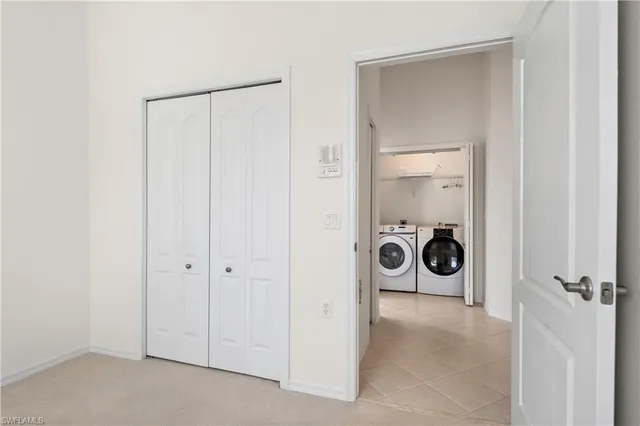 a view of a storage & utility room with a sink