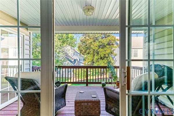 a view of a porch with furniture