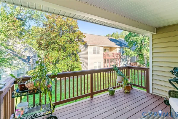 a view of a two chairs in the balcony