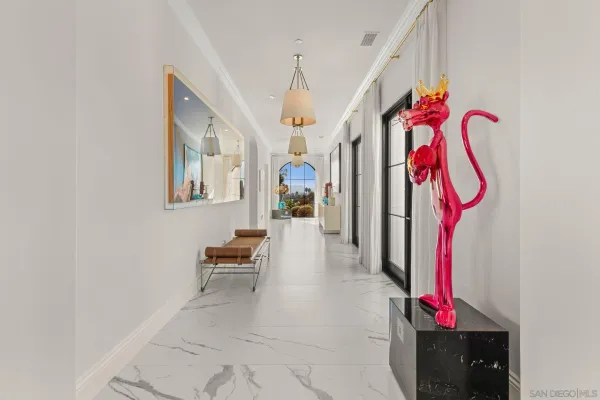 a view of an entryway with a workspace