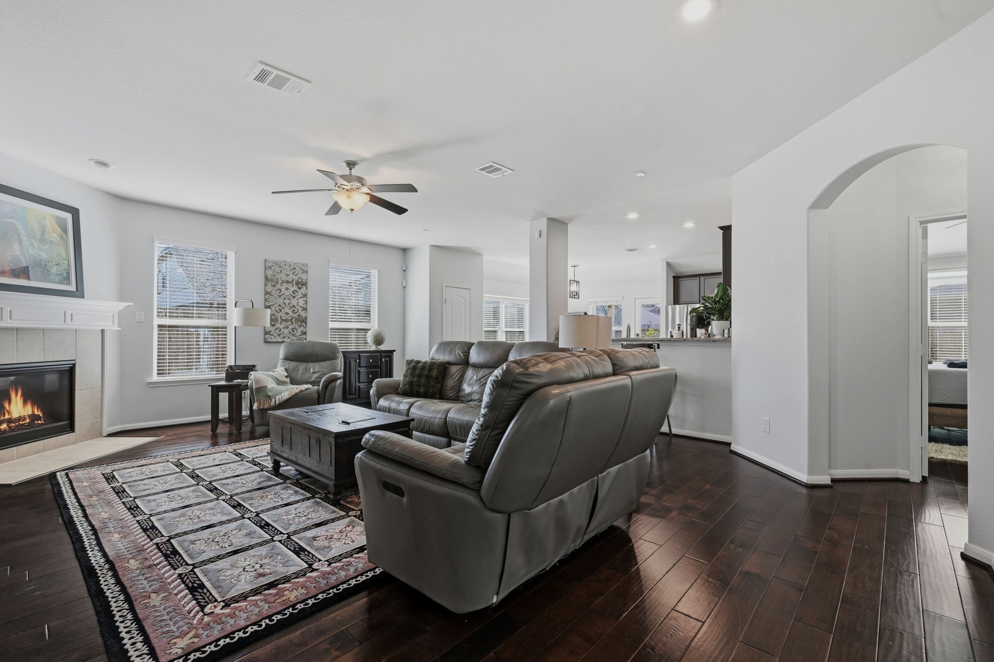 3646 Gable Landing Lane Spring, TX 77386 - Photo 3 of 43 a living room with furniture fireplace and wooden floor