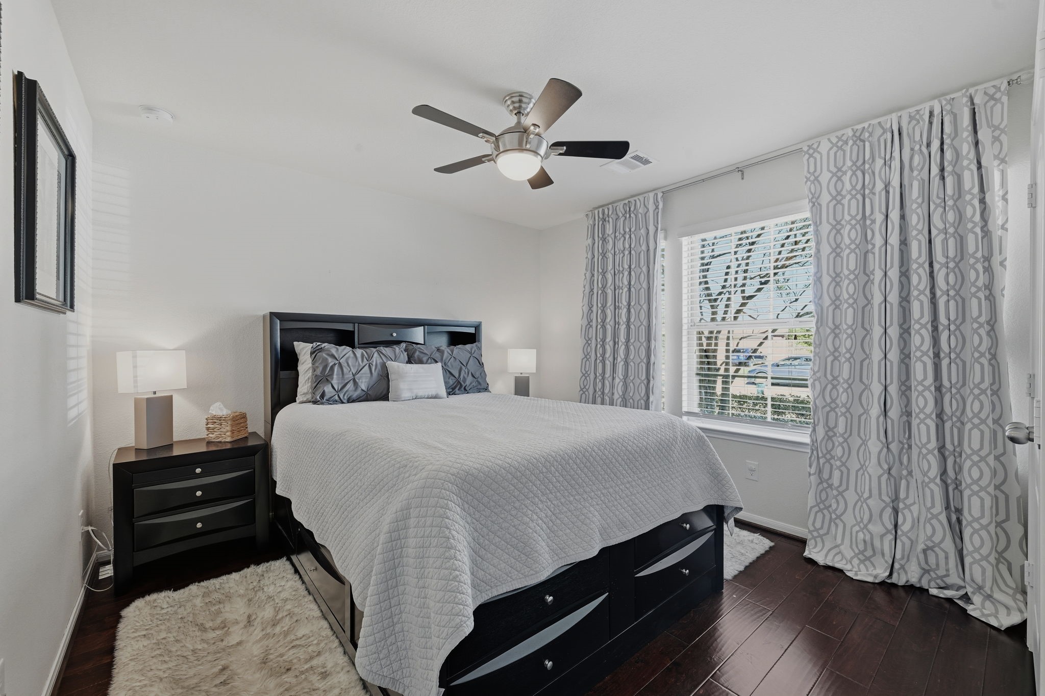 3646 Gable Landing Lane Spring, TX 77386 - Photo 34 of 43 a bedroom with a bed and wooden floor