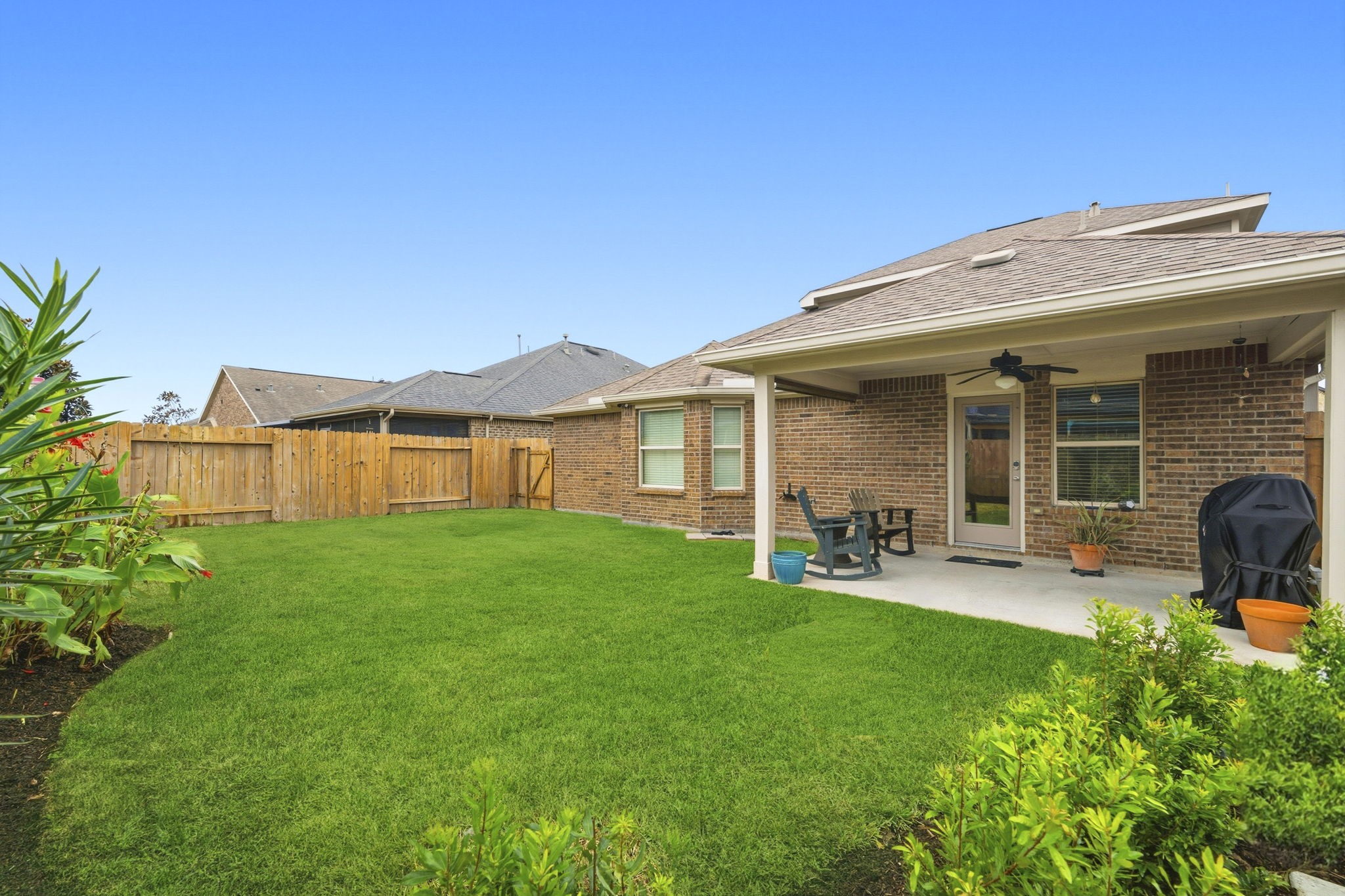 3646 Gable Landing Lane Spring, TX 77386 - Photo 41 of 43 a view of a house with backyard porch and sitting area