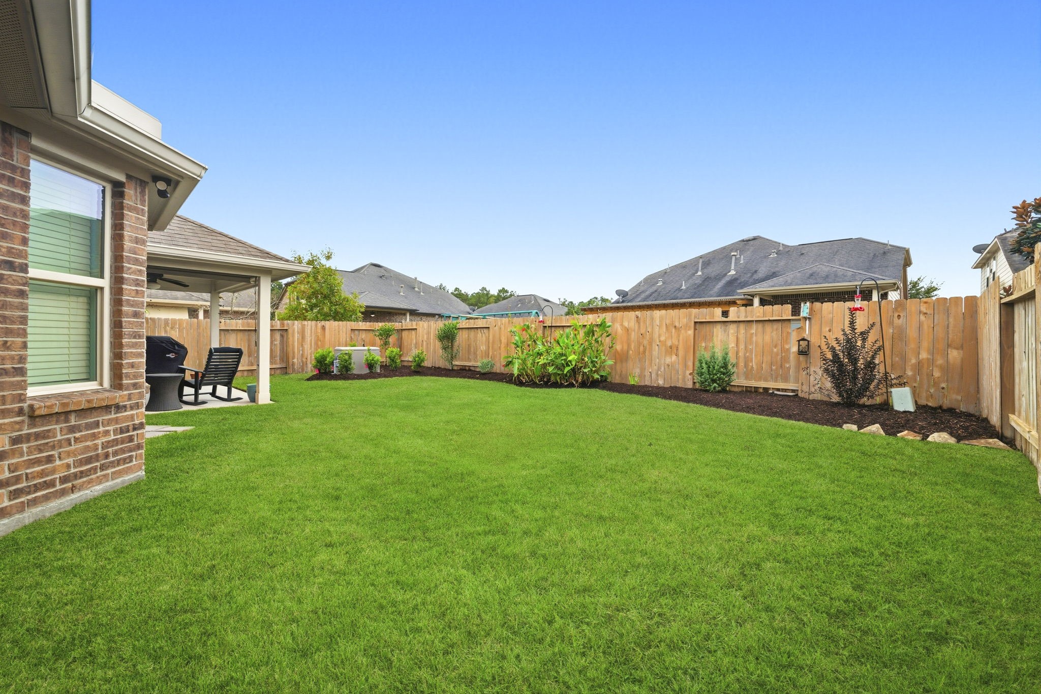 3646 Gable Landing Lane Spring, TX 77386 - Photo 42 of 43 a view of an house with backyard space and garden