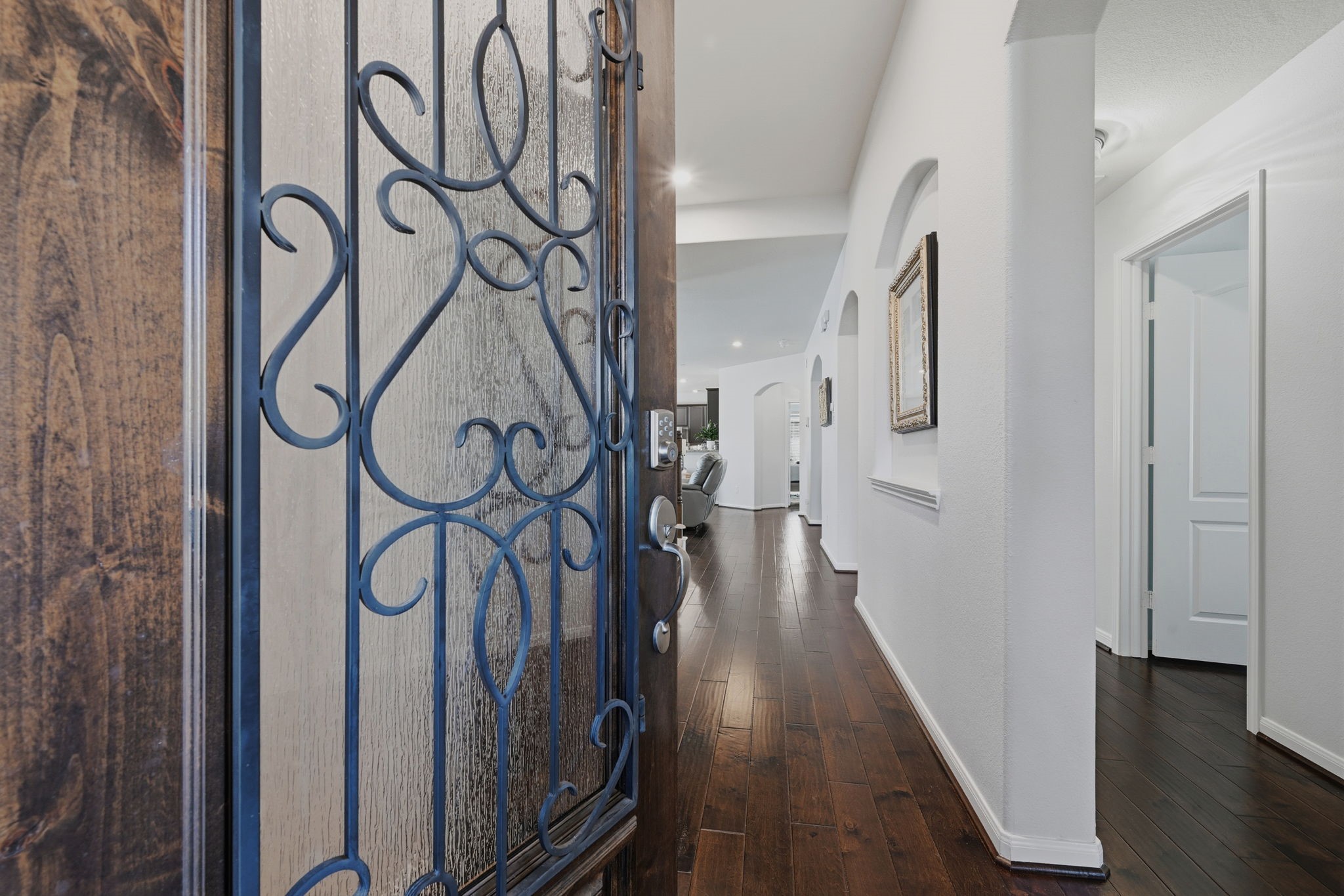 3646 Gable Landing Lane Spring, TX 77386 - Photo 7 of 43 a view of an entryway with wooden floor