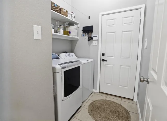 a storage room with washer and dryer