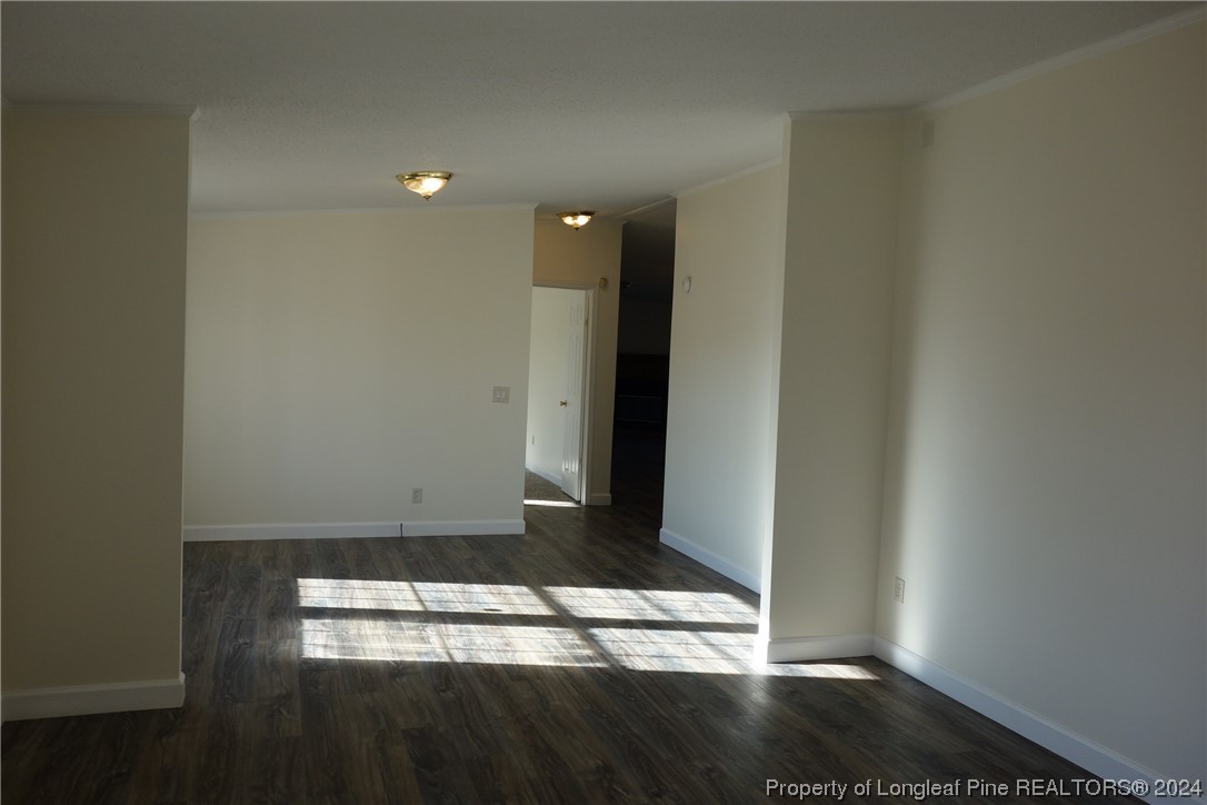 3001 Popes Crossing Road Lumberton, NC 28358 - Photo 21 of 43 a view of empty room with wooden floor