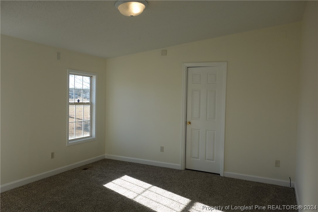 3001 Popes Crossing Road Lumberton, NC 28358 - Photo 31 of 43 an empty room with windows