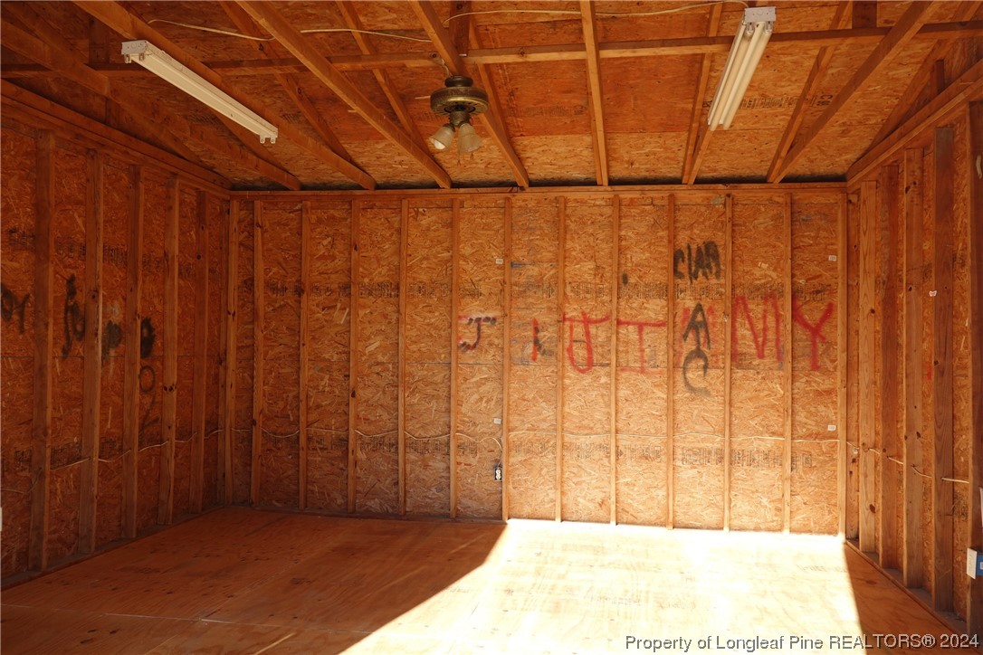 3001 Popes Crossing Road Lumberton, NC 28358 - Photo 39 of 43 a bathroom with a shower curtain
